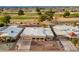 Aerial view of home near golf course with other houses in the surrounding neighborhood at 10818 W Palmeras Dr, Sun City, AZ 85373