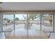 A cozy dining area with a view to the back patio at 10818 W Palmeras Dr, Sun City, AZ 85373