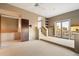 Open bedroom layout with sliding glass doors leading to a private balcony at 11082 E Mark Ln, Scottsdale, AZ 85262