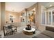 Open-concept foyer features elegant archways, staircase, and floods of natural light, creating an inviting entrance at 11082 E Mark Ln, Scottsdale, AZ 85262