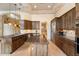 Gourmet kitchen featuring custom cabinets, stainless steel appliances and granite counters at 11082 E Mark Ln, Scottsdale, AZ 85262