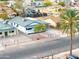 View of an updated single Gathering home with white exterior, gray roof and xeriscaped front yard at 1133 E 4Th St, Casa Grande, AZ 85122