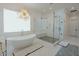 Luxurious bathroom featuring a freestanding tub and walk-in shower at 11745 N 99Th St, Scottsdale, AZ 85260