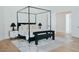 Bright bedroom with a stylish canopy bed and neutral decor at 11745 N 99Th St, Scottsdale, AZ 85260