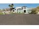 Stunning two story home with a circular drive and well manicured yard at 11745 N 99Th St, Scottsdale, AZ 85260