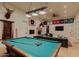 Game room featuring pool table and sports memorabilia, perfect for entertaining at 11745 N 99Th St, Scottsdale, AZ 85260