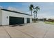 Spacious garage with parking for two cars and ample driveway space at 11745 N 99Th St, Scottsdale, AZ 85260