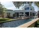 Beautiful pool area with a water feature and comfortable lounge seating, creating a serene and luxurious outdoor space at 11745 N 99Th St, Scottsdale, AZ 85260
