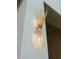 Elegant wall sconce illuminates any room with its stylish design at 11745 N 99Th St, Scottsdale, AZ 85260