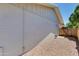 The exterior features an outdoor gravel area and side door on a sunny day at 1206 E Greenway Dr, Tempe, AZ 85282