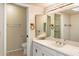 Classic bathroom featuring a vanity with plenty of counter space and a shower/tub combo at 1221 E Palacio Dr, Phoenix, AZ 85014