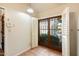 Bright entryway featuring tile flooring, sliding glass doors, and convenient access to other areas of the home at 1221 E Palacio Dr, Phoenix, AZ 85014