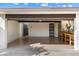 Spacious garage with ample storage, utility sink, and organization, great for projects and parking at 1221 E Palacio Dr, Phoenix, AZ 85014