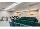 Lecture hall with tiered seating, a projector, and a screen at 1222 Leisure World --, Mesa, AZ 85206