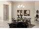 Elegant dining room with chandelier lighting and designer decor at 12245 E Clinton St, Scottsdale, AZ 85259