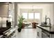 Open-concept floor plan seamlessly blends the kitchen and living room at 12245 E Clinton St, Scottsdale, AZ 85259