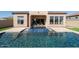 Backyard pool and patio featuring outdoor seating at 12245 E Clinton St, Scottsdale, AZ 85259