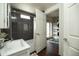 The bathroom features a tiled shower and a vanity at 1305 E Brill St, Phoenix, AZ 85006