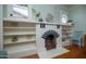 Charming dining area with built-in shelves and detailed fireplace at 1305 E Brill St, Phoenix, AZ 85006