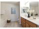 Bathroom featuring double sink vanity, neutral walls, and soaking tub at 14000 N 94Th St # 3159, Scottsdale, AZ 85260