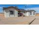 Charming single-story home featuring a well-maintained exterior with a gravel yard and a cozy front entrance at 1401 N Houck St, Casa Grande, AZ 85122