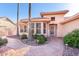 Charming single-story home featuring desert landscaping and a tile roof at 14817 W Domingo Ln, Sun City West, AZ 85375