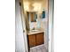 Cozy bathroom features a vanity with wood cabinets and a neutral countertop at 16402 N 31St St # 134, Phoenix, AZ 85032