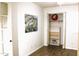 Bedroom featuring a closet, wood laminate flooring, and neutral walls at 16402 N 31St St # 134, Phoenix, AZ 85032