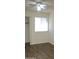 Bedroom featuring a closet, a window with blinds, and wood-look flooring at 16402 N 31St St # 134, Phoenix, AZ 85032