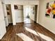 Bedroom with wood laminate flooring, closet, and natural light at 16402 N 31St St # 134, Phoenix, AZ 85032