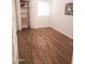 Cozy bedroom features a window, new hardwood floors, and closet, offering a comfortable and private space at 16402 N 31St St # 134, Phoenix, AZ 85032