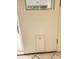 A white door with pet door, and a small window allows natural light at 16402 N 31St St # 134, Phoenix, AZ 85032