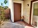 The outdoor entrance is adorned with decorative flowers in front of stucco siding at 16402 N 31St St # 134, Phoenix, AZ 85032