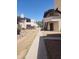 Well-maintained condo exterior with landscaping, pedestrian walkway, and private patio, offering a comfortable outdoor space at 16402 N 31St St # 134, Phoenix, AZ 85032