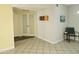 Bright living room with tile floors, light grey walls, and natural light at 16402 N 31St St # 134, Phoenix, AZ 85032