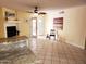 Living room featuring a fireplace and access to the backyard at 16402 N 31St St # 134, Phoenix, AZ 85032