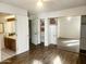 Spacious main bedroom with wood-look floors, large closet, and ensuite bathroom at 16402 N 31St St # 134, Phoenix, AZ 85032