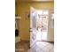 Bright living area with a tiled floor and sliding doors to the outdoor patio at 16402 N 31St St # 134, Phoenix, AZ 85032