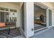 Inviting balcony with wood bench seating and sliding glass door access to the comfortable living room at 1717 E Morten Ave # 16, Phoenix, AZ 85020