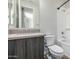 Bathroom showcasing vanity with a sink, toilet, and a shower-tub combination at 1717 E Morten Ave # 16, Phoenix, AZ 85020