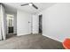This bedroom features a doorway to the bathroom and an open door to the staircase at 1717 E Morten Ave # 16, Phoenix, AZ 85020