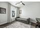 Modern bedroom featuring a stylish ceiling fan and patterned rug at 1717 E Morten Ave # 16, Phoenix, AZ 85020