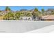 Scenic exterior view of a property showcasing its mountain backdrop, palm trees, and stylish architectural design at 1717 E Morten Ave # 16, Phoenix, AZ 85020