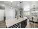 Bright kitchen features a center island with seating and modern appliances at 1717 E Morten Ave # 16, Phoenix, AZ 85020