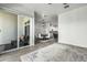 Bright and airy living space featuring an open floor plan with a dining area and balcony access at 1717 E Morten Ave # 16, Phoenix, AZ 85020