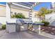 Outdoor kitchen featuring a built-in grill, perfect for entertaining and enjoying al fresco dining in style at 1717 E Morten Ave # 16, Phoenix, AZ 85020
