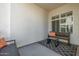 Cozy patio with a bench, table, and patterned rug at 1717 E Morten Ave # 16, Phoenix, AZ 85020