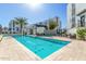 Large community pool surrounded by modern apartments, providing a luxurious and refreshing amenity for residents at 1717 E Morten Ave # 16, Phoenix, AZ 85020