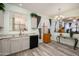 Charming kitchen with light granite counters and stainless steel appliances at 18080 W Udall Dr, Surprise, AZ 85374