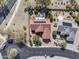 Stunning aerial view of tile roof home with pool, spa, and lush desert landscaping at 18400 N Deer Grass Ct, Surprise, AZ 85374